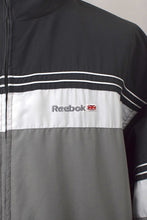 Load image into Gallery viewer, Reebok Brand Spray Jacket
