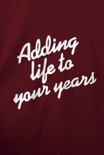 Load image into Gallery viewer, 80s The Welness Center T-Shirt

