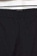 Load image into Gallery viewer, 00s Nike Brand Track Pants
