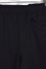 Load image into Gallery viewer, 00s Nike Brand Track Pants
